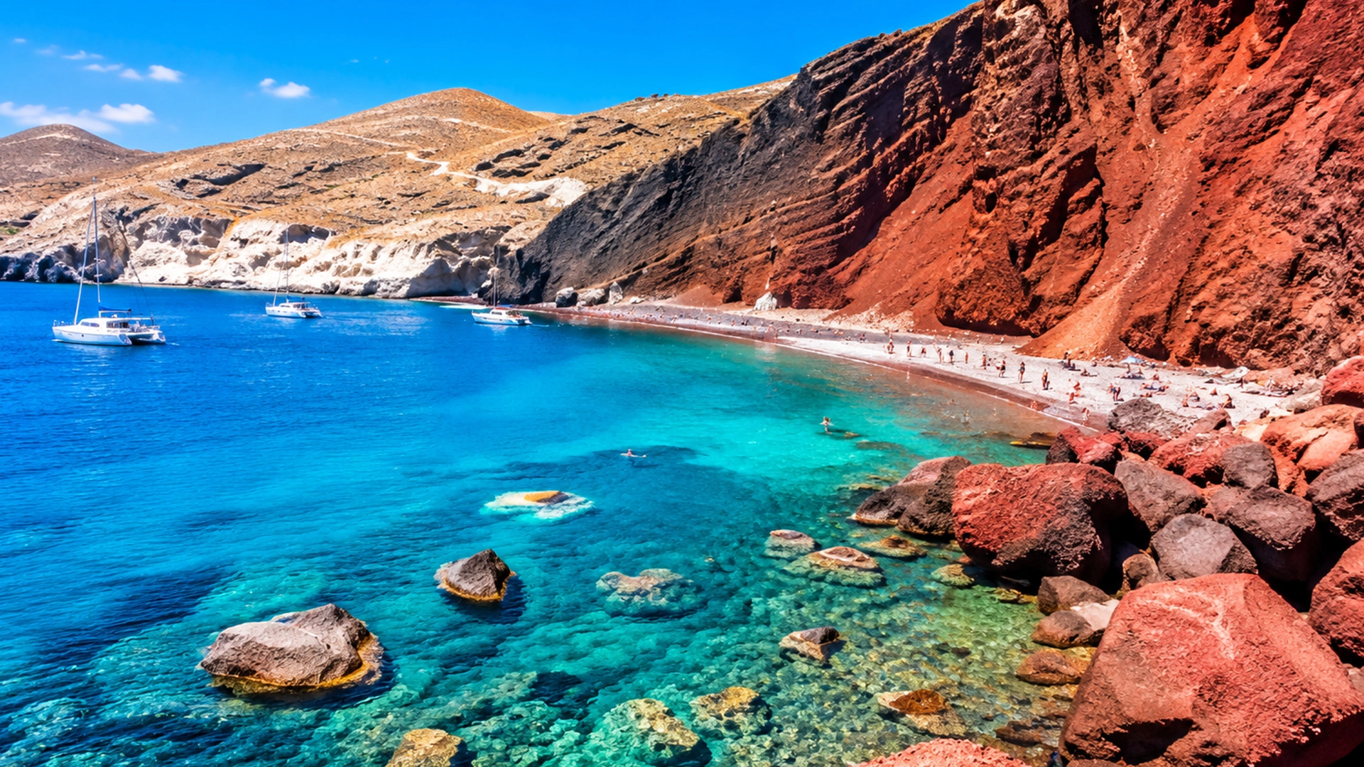 Famous Red Beach with dramatic volcanic cliffs in Santorini Greece