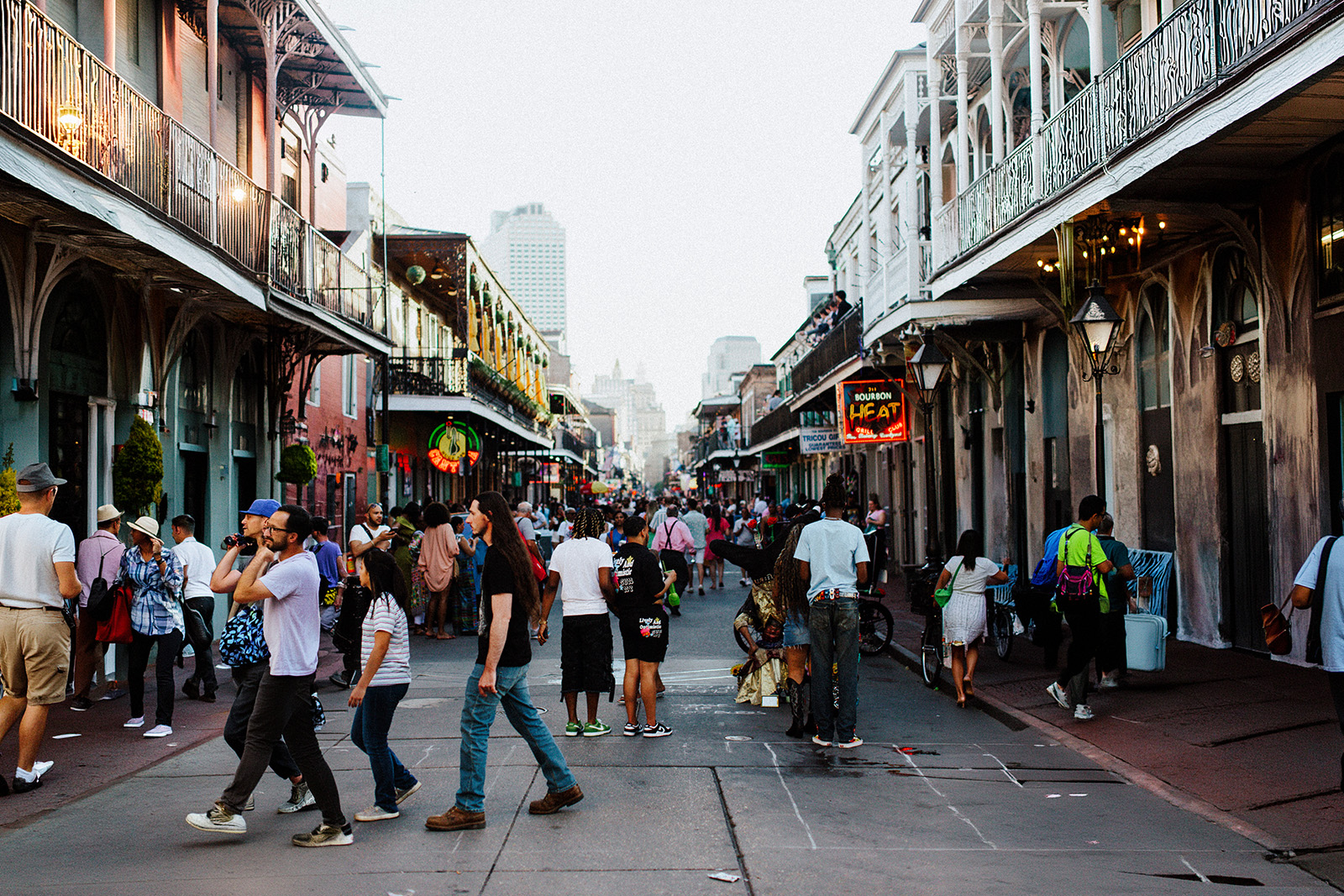 Famous Bourbon Street in New Orleans illuminated with colorful neon lights and vibrant nightlife