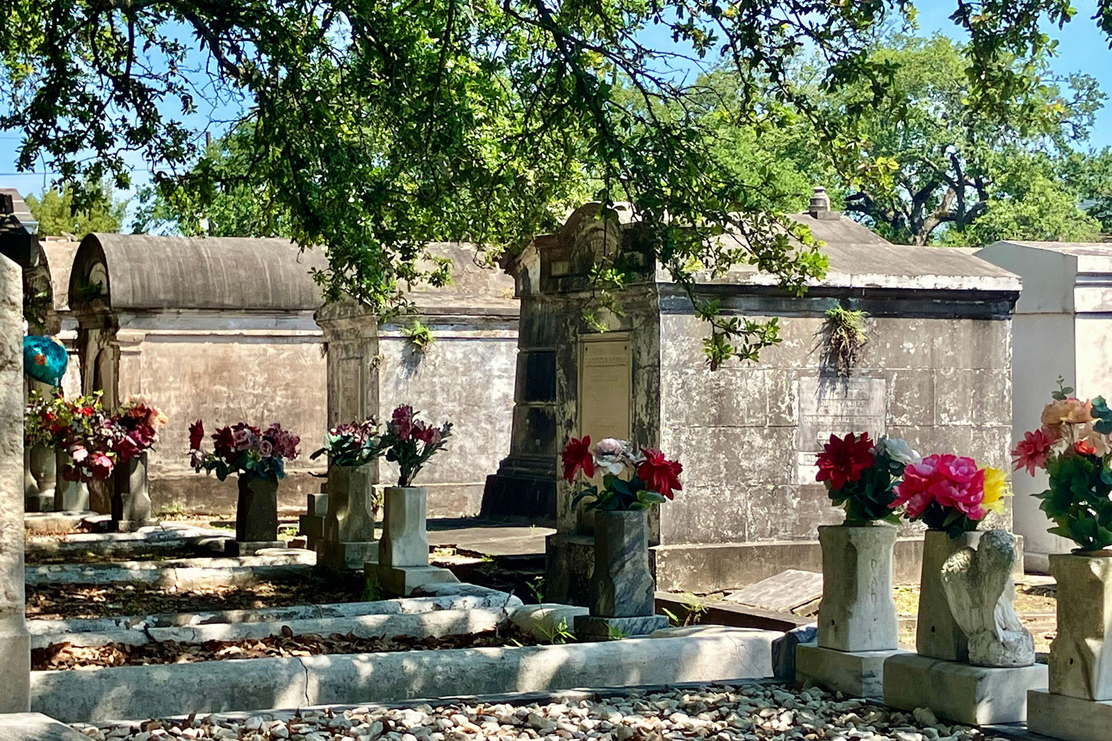 Historic above ground tombs and ornate mausoleums in a famous New Orleans Louisiana cemetery
