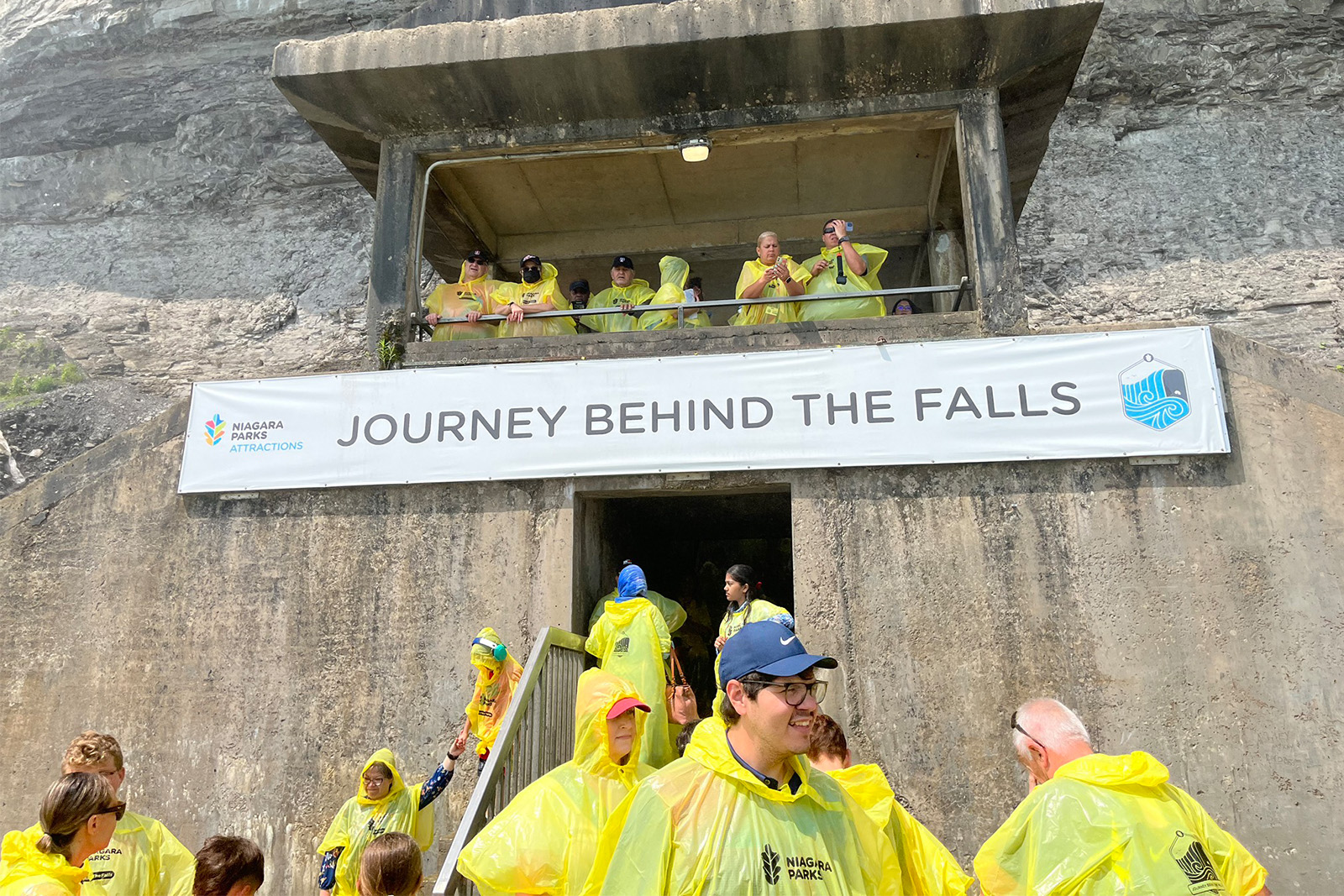 Journey Behind the Falls observation platform with visitors experiencing the powerful Horseshoe Falls up close