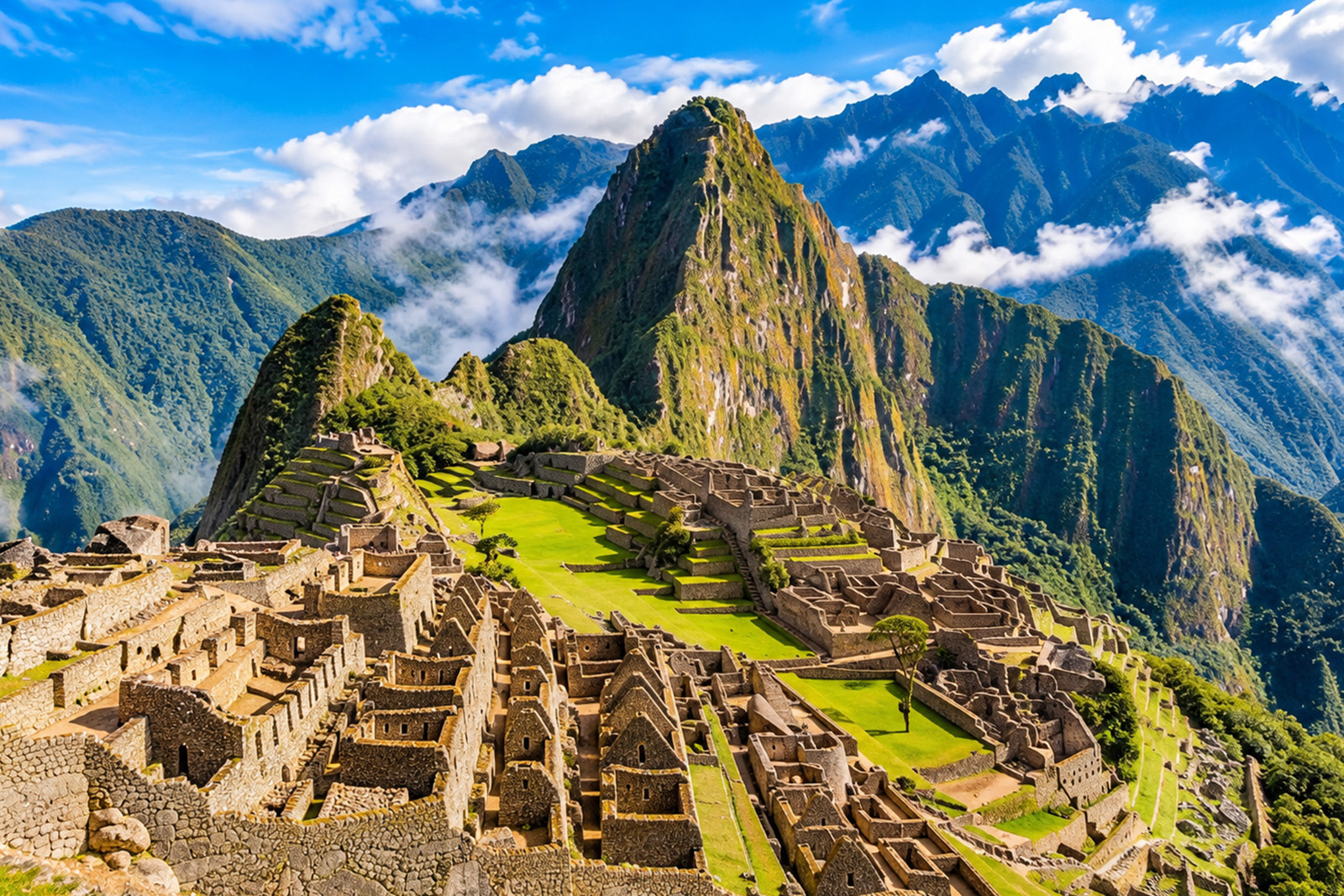 Panoramic view of the ancient Inca citadel of Machu Picchu surrounded by the majestic Andes Mountains in Peru